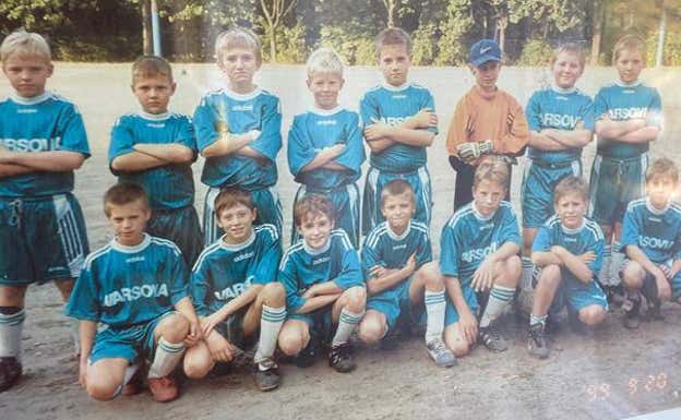 Lewandowski ( el segundo abajo a la izquierda), junto a sus compañeros.  RELEVO