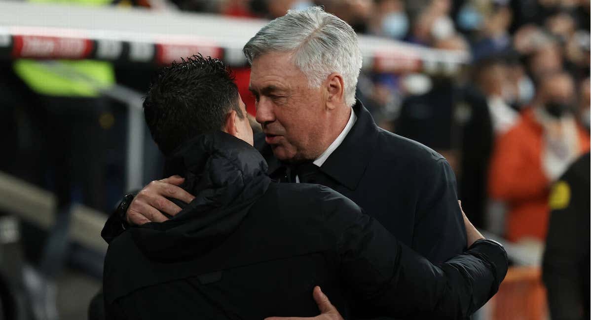 Xavi y Ancelotti./GETTY