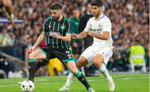 Asensio presiona a Taylor en una acción del Real Madrid-Celtic  Getty.