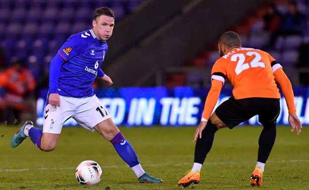 John Rooney, a la izquierda. Getty Images