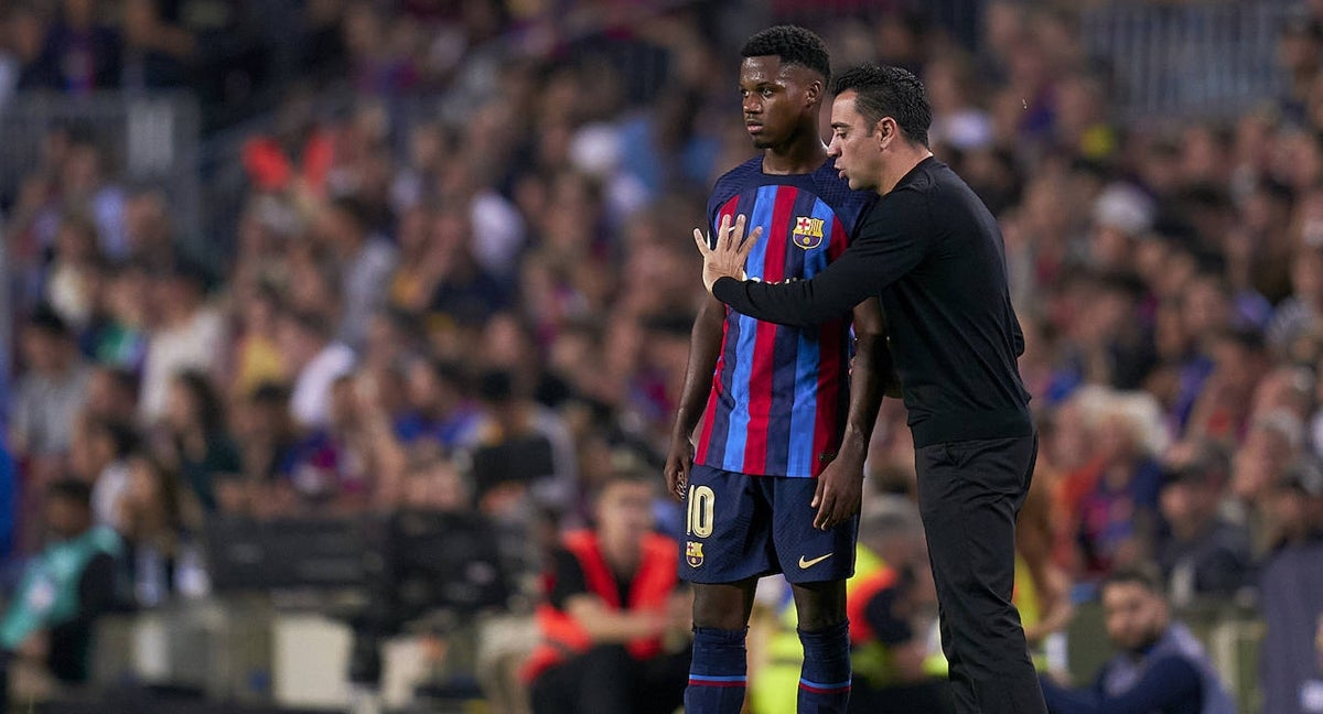 Ansu y Xavi, durante esta temporada.