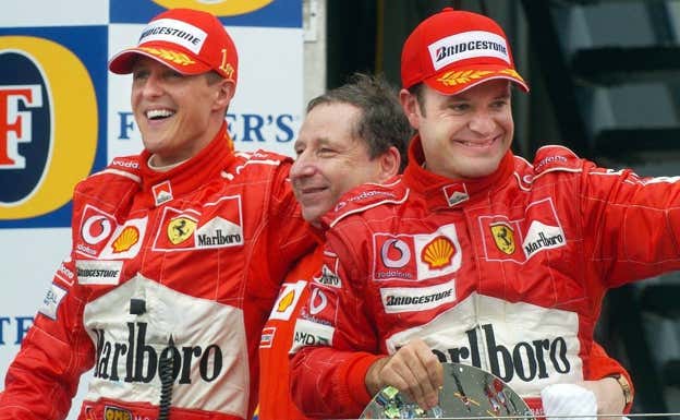 Schumacher, Todt y Barrichello, en un podio con Ferrari.  EFE