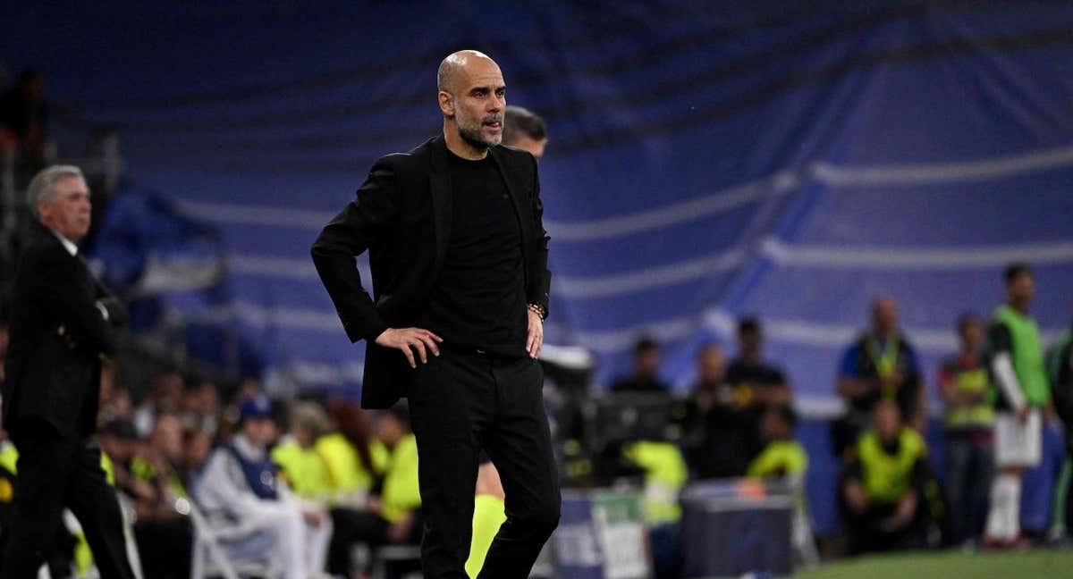 Pep Guardiola en la banda del Santiago Bernabéu./AFP