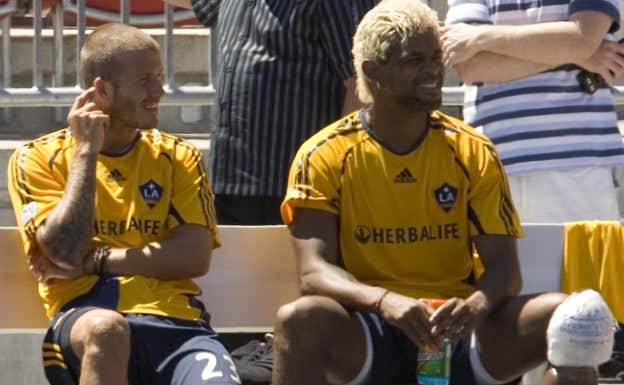 Beckham y Abel Xavier, juntos durante su etapa en LA Galaxy. AFP
