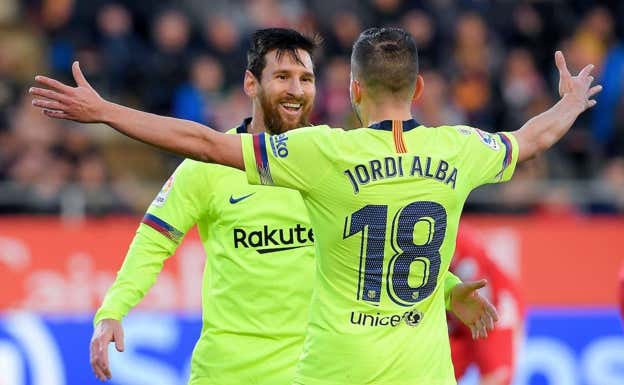 Messi y Jordi Alba celebrando un gol.