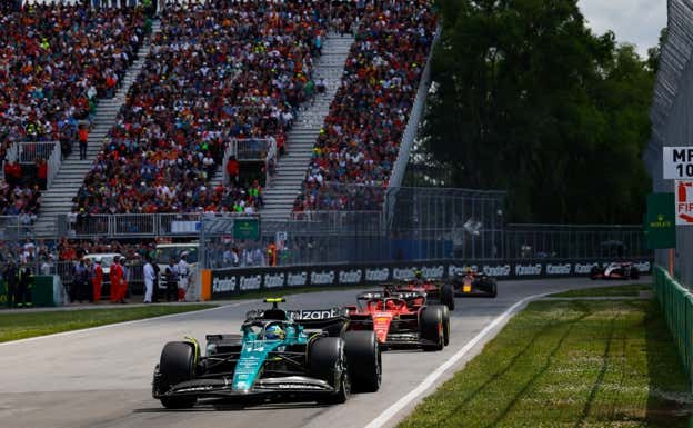 Fernando Alonso, los dos Ferrari y Sergio Pérez, durante el GP de Canadá 2023.  Aston Martin