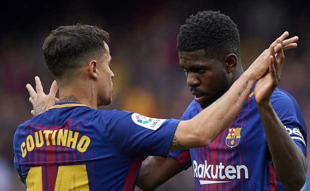 Coutinho y Umtiti celebran un gol en el Barcelona en 2018 contra el Valencia. QUALITY SPORT IMAGES / GETTY IMAGES