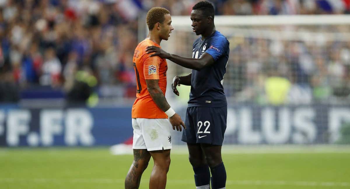 Memphis y Mendy, en un partido entre Países Bajos y Francia en 2018. /GETTY