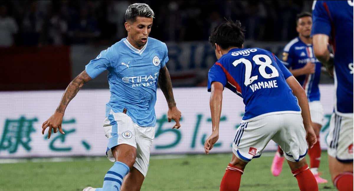 Cancelo durante un amistoso de pretemporada con el Manchester City./AFP