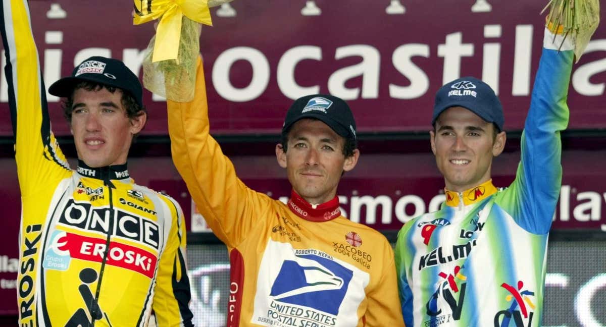 Isidro Nozal, Roberto Heras y Alejandro Valverde, en el podio de la Vuelta de 2003./Reuters