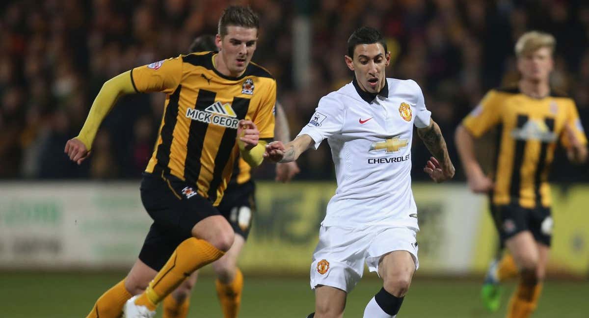 Liam Hughes y Angel Di María. /GETTY