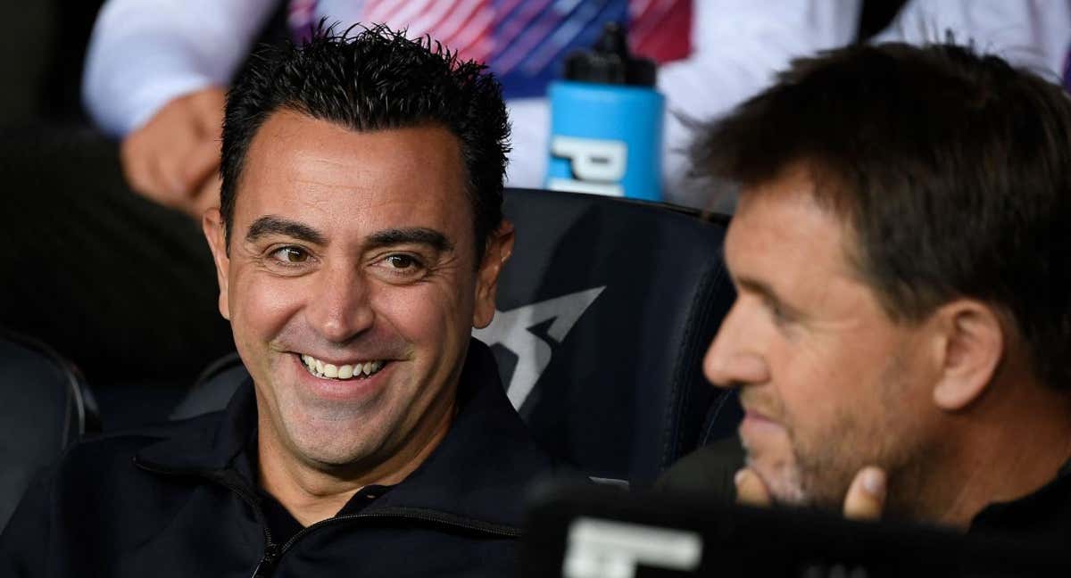 Xavi Hernández, en el banquillo antes del partido./Josep LAGO / AFP