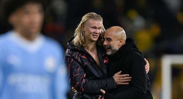 Haaland y Guardiola celebran tras el partido.