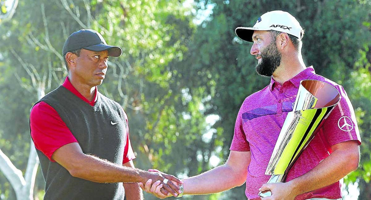 Jon Rahm y Tiger Woods, en un torneo este mismo año. /AFP