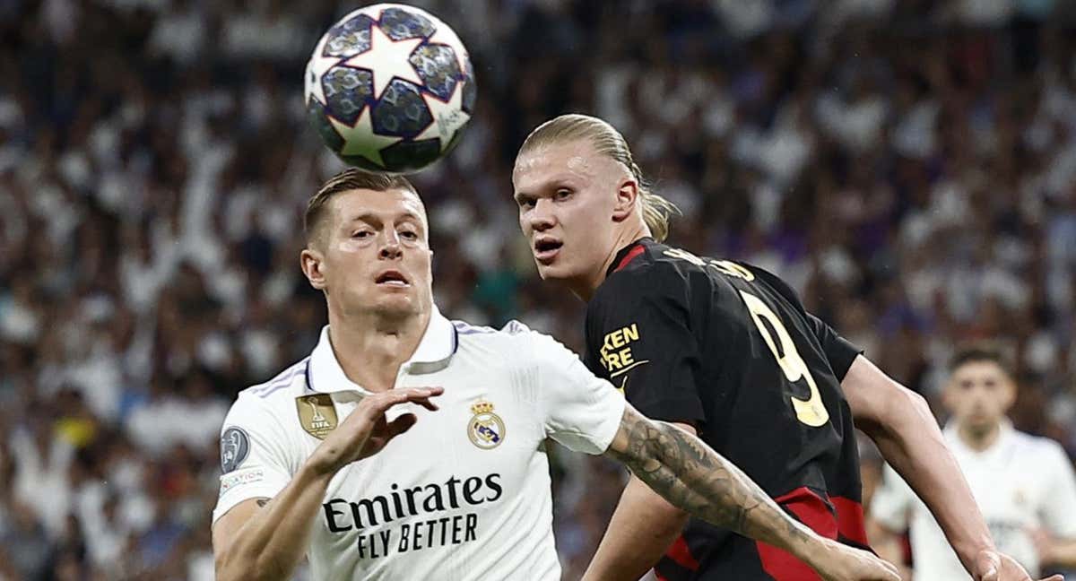 Tony Kroos y Erling Haaland durante un partido de Champions./Reuters