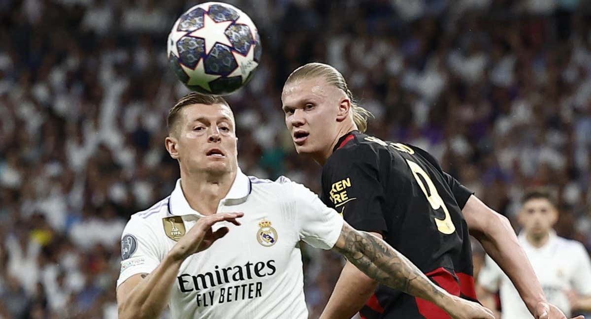 Tony Kroos y Erling Haaland durante un partido de Champions.