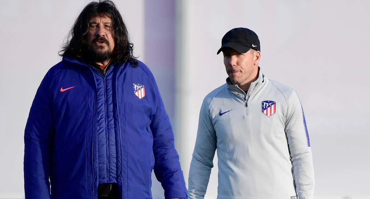 El Mono Burgos y Simeone./AFP