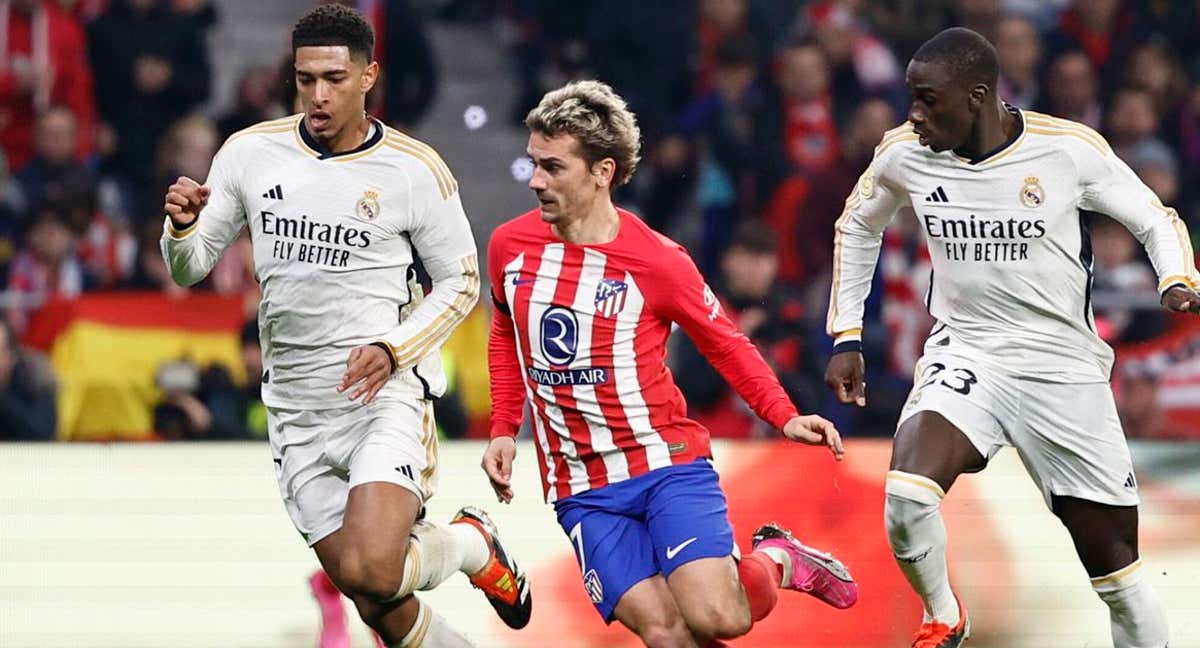 Bellingham, Griezmann y Mendy, durante un derbi madrileño.