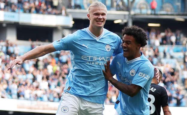 Haaland y Bobb celebran un gol del Manchester City. Getty Images