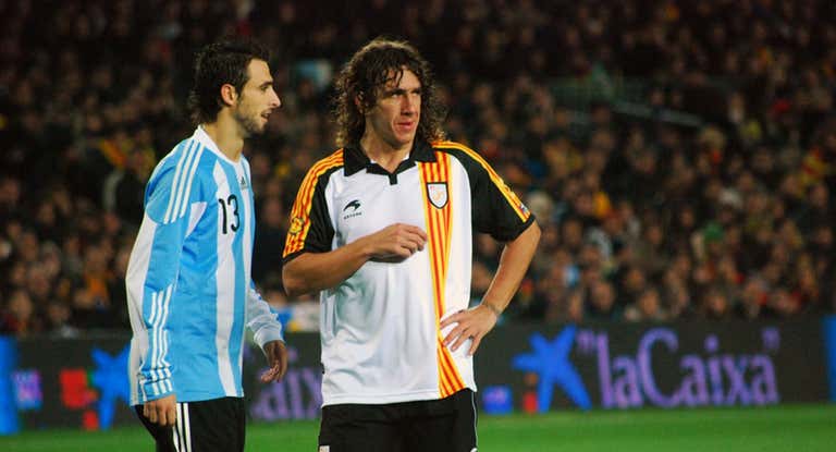 Pareja y Puyol, en el Cataluña-Argentina de 2009.
