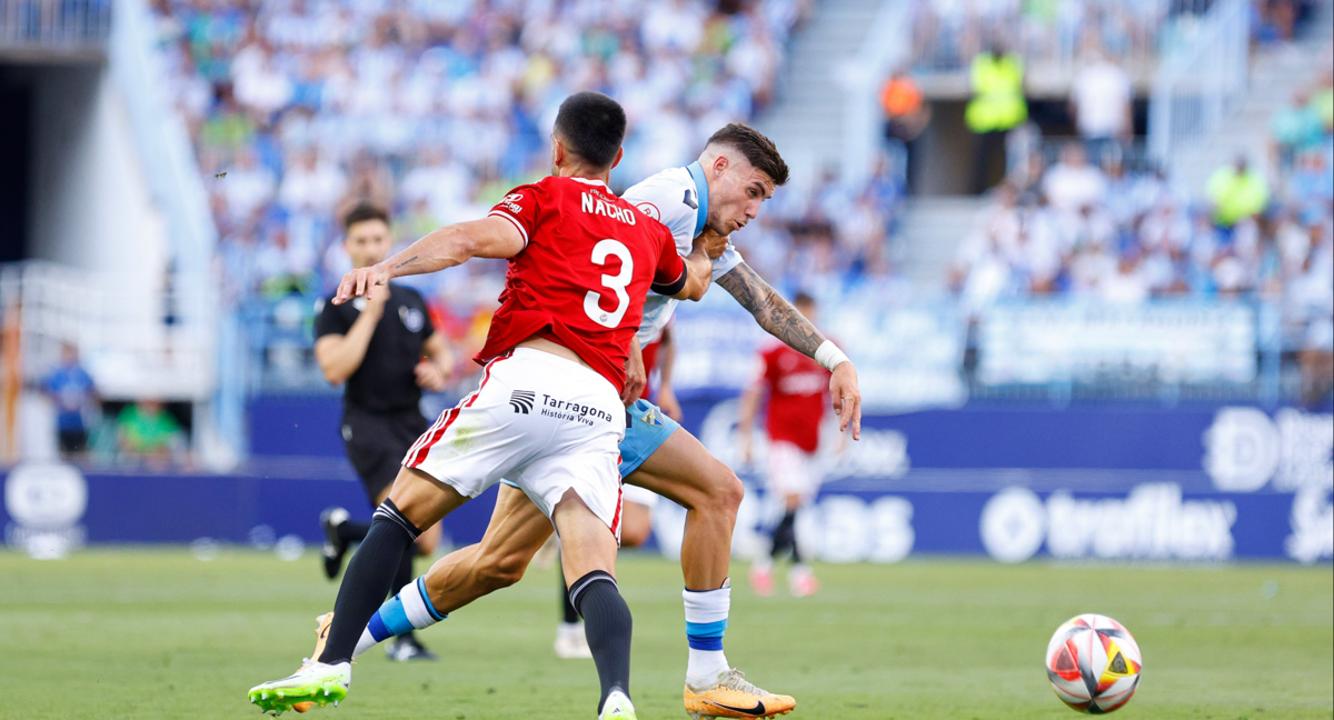 Partido de ida entre el Nàstic y el Málaga CF /TWITTER MÁLAGA CF