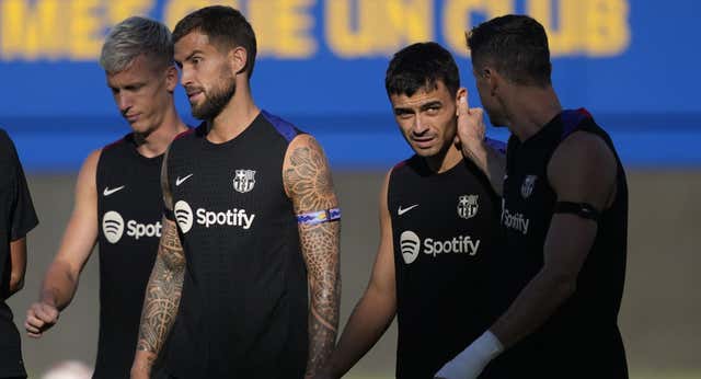 La factura que debe el Barça por Flick, Dani Olmo, Iñigo Martínez y Szczesny llega el 1 de julio