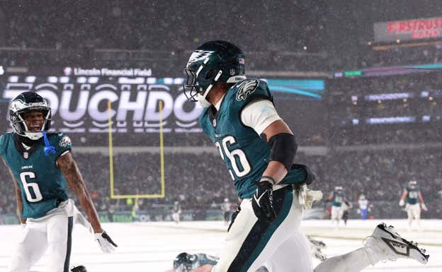 Saquon Barkley celebra un touchdown en la nieve. Reuters