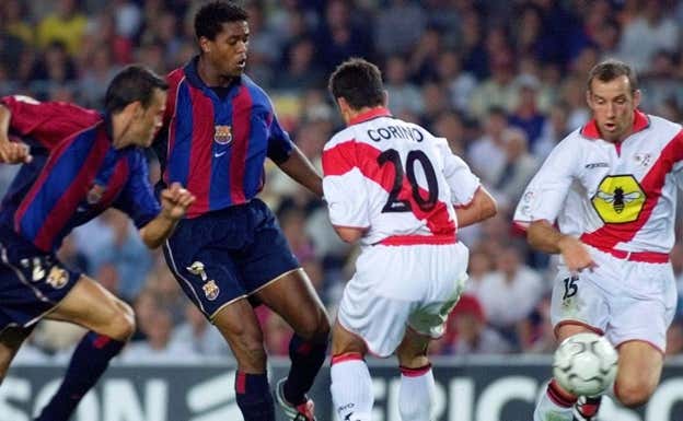 Roy, a la derecha, contra el Barça.