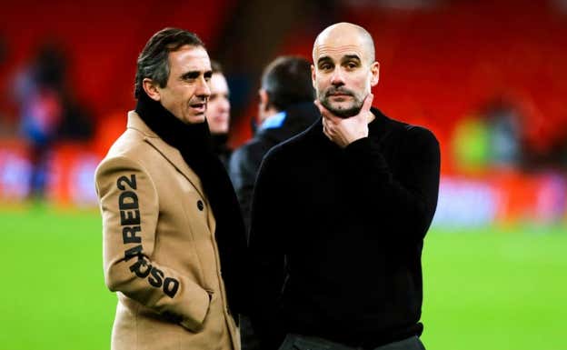 Manel Estiarte junto a Pep Guardiola después de un partido. REUTERS