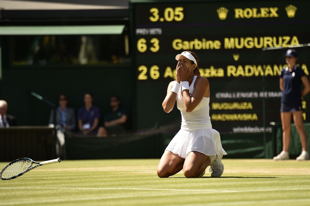 Muguruza celebra su triunfo en Wimbledon 2017. AFP